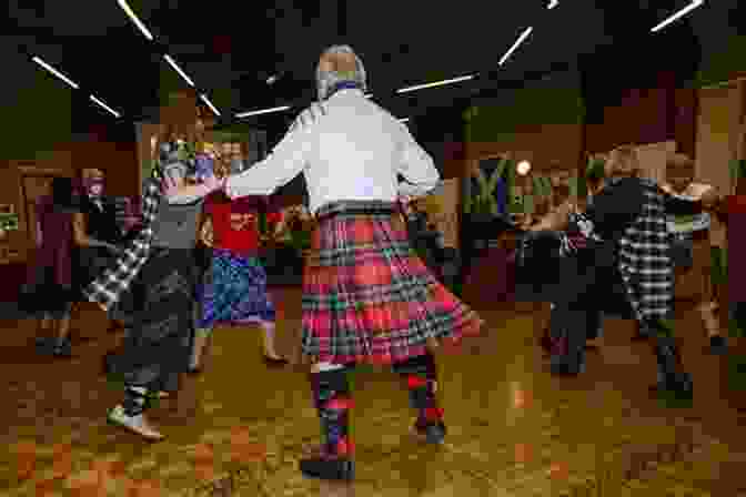 A Lively Scene Of A Traditional Scottish Ceilidh, With People Dancing And Playing Music. Mini Kilt Tours On The Trail Of Outlander Perth To Inverness