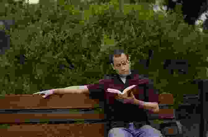 A Man Sitting On A Park Bench, Reading A Book. Visions Of Spain: A Medley Of Memoir History And Anecdote